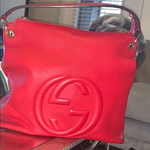 Red Gucci hobo bag